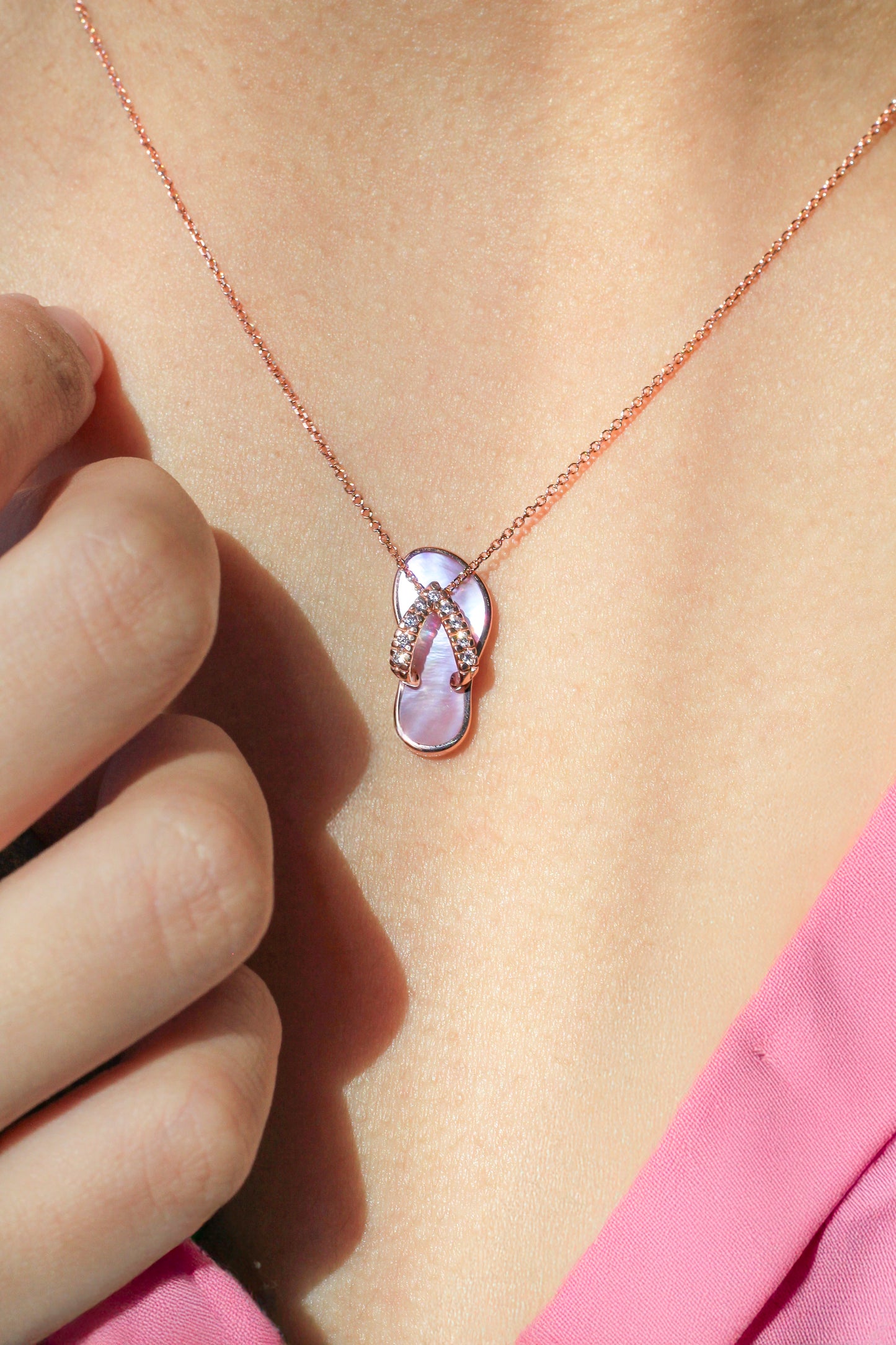Rose gold Slipper pendant with pink mother-of-pearl and diamonds on a person's neck - 10807