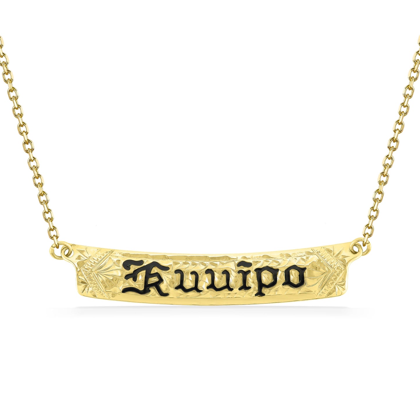 Centered on a gold chain, the engraved Kuuipo nameplate features detailed floral carving & black enamel text. Item No. 60140