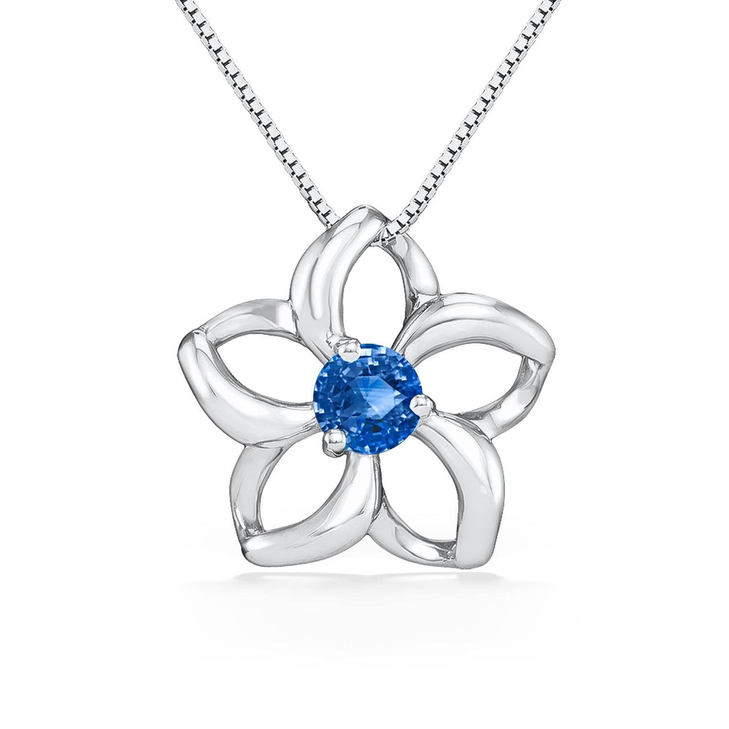 Graceful white gold pendant shaped like the iconic plumeria, centered with a stunning blue sapphire stone. Item No. 40039