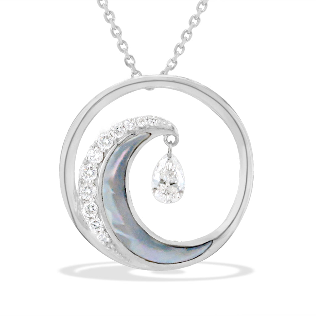 Wave pendant with mother-of-pearl inlay, pavé-set diamonds on one side, and a pear-shaped shimmer dangling. Item No. 40158
