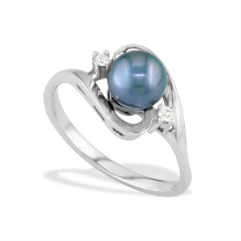 White gold ring with a single blue Akoya pearl accented by two small diamonds in a flowing setting. Item No. 13641