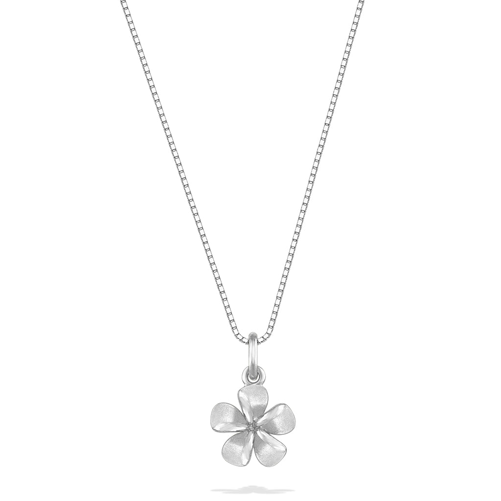Children’s white gold necklace with a single plumeria flower pendant on a fine chain. Item No. 41430