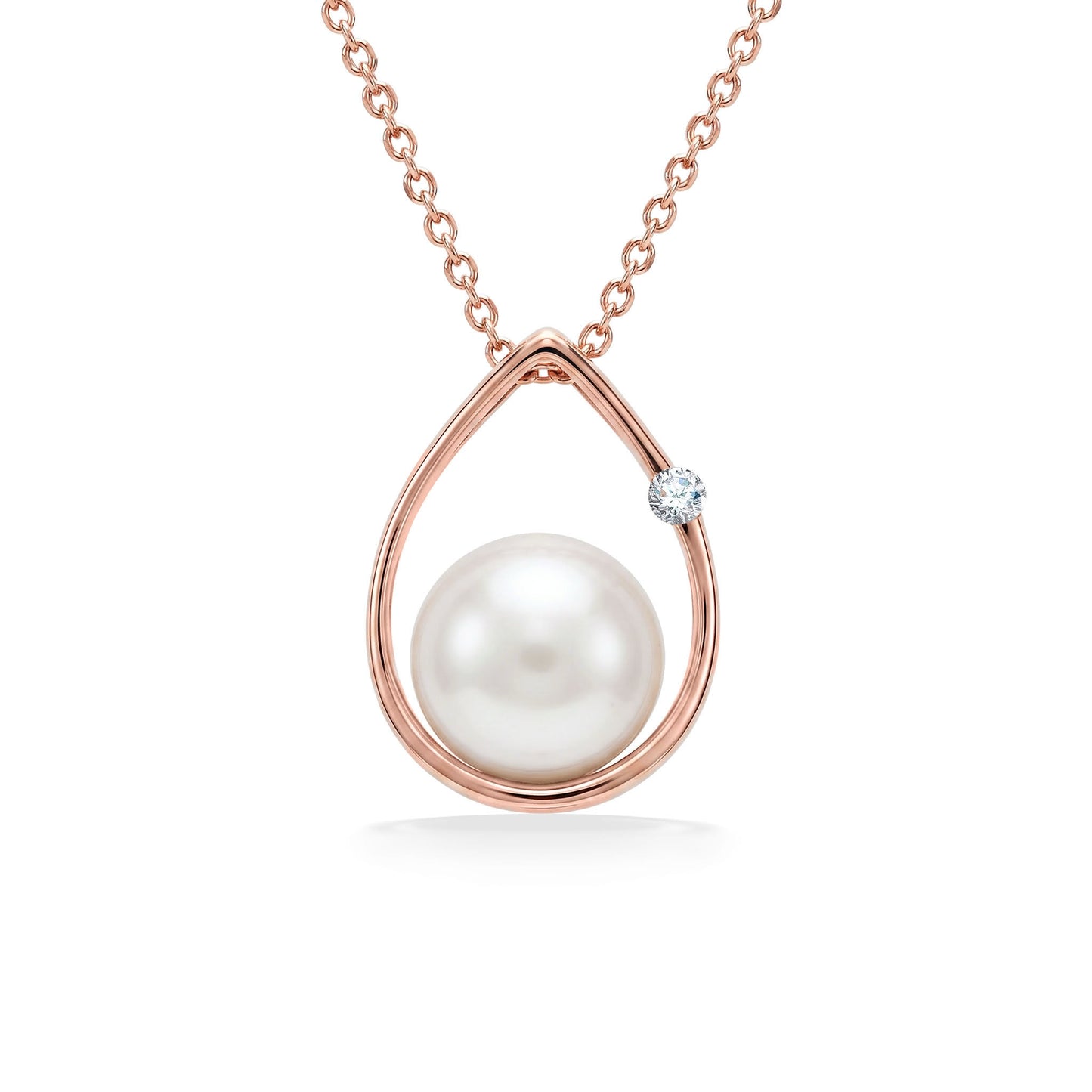 Raindrop shaped pendant made in 14k rose gold with white akoya pearl and diamond accent. Item No. 41230