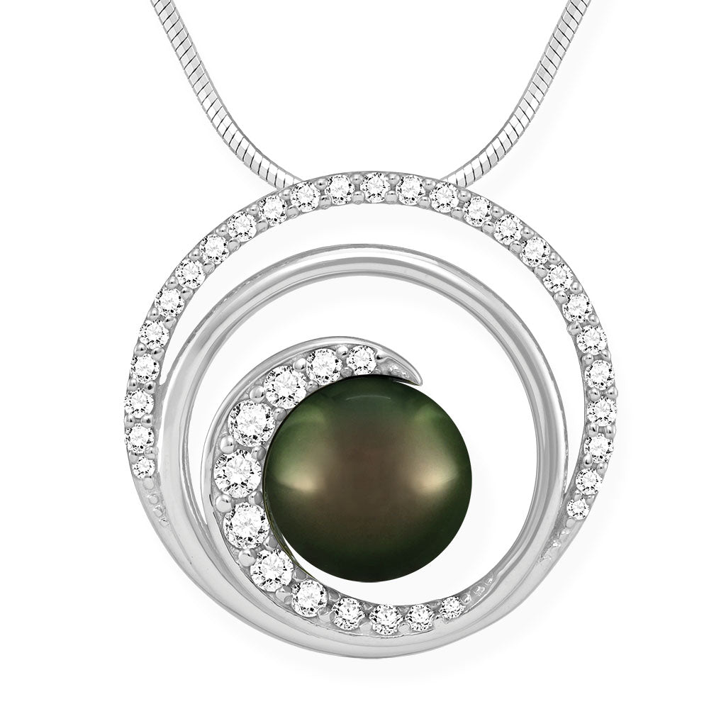 Circle pendant with wave design set in white gold with diamond details & a center 10mm tahititan black pearl. Item No. 40666