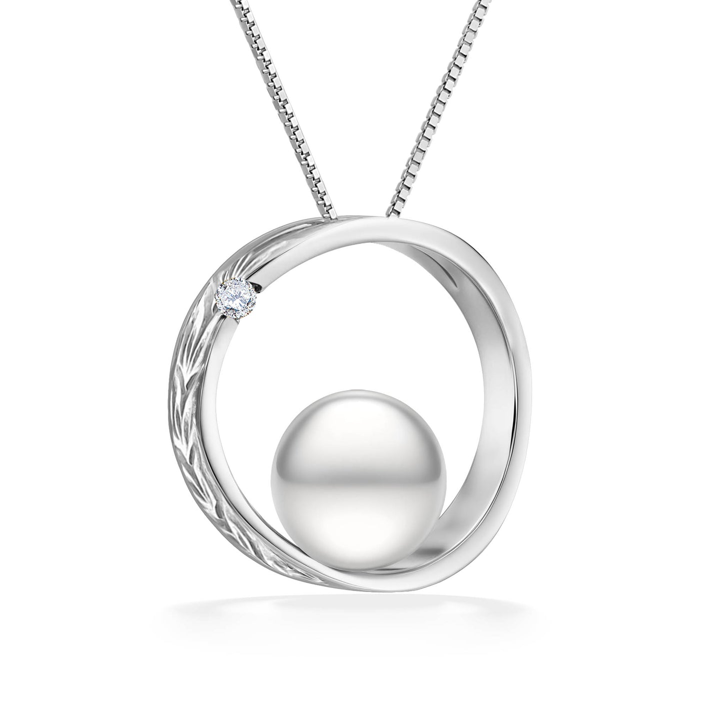 Polished white gold scroll design surrounds a 7mm white Akoya pearl, finished with a 0.02 carat diamond. Item No. 43163