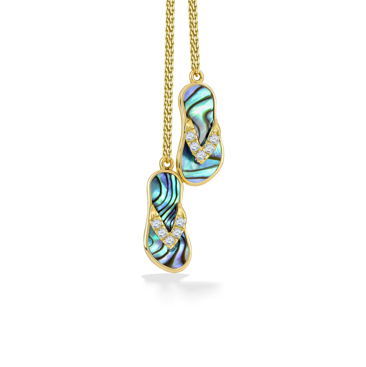 Closer view of the abalone inlay and diamond-set straps on a yellow gold Hawaiian slipper lariat drop. Item No. 47563