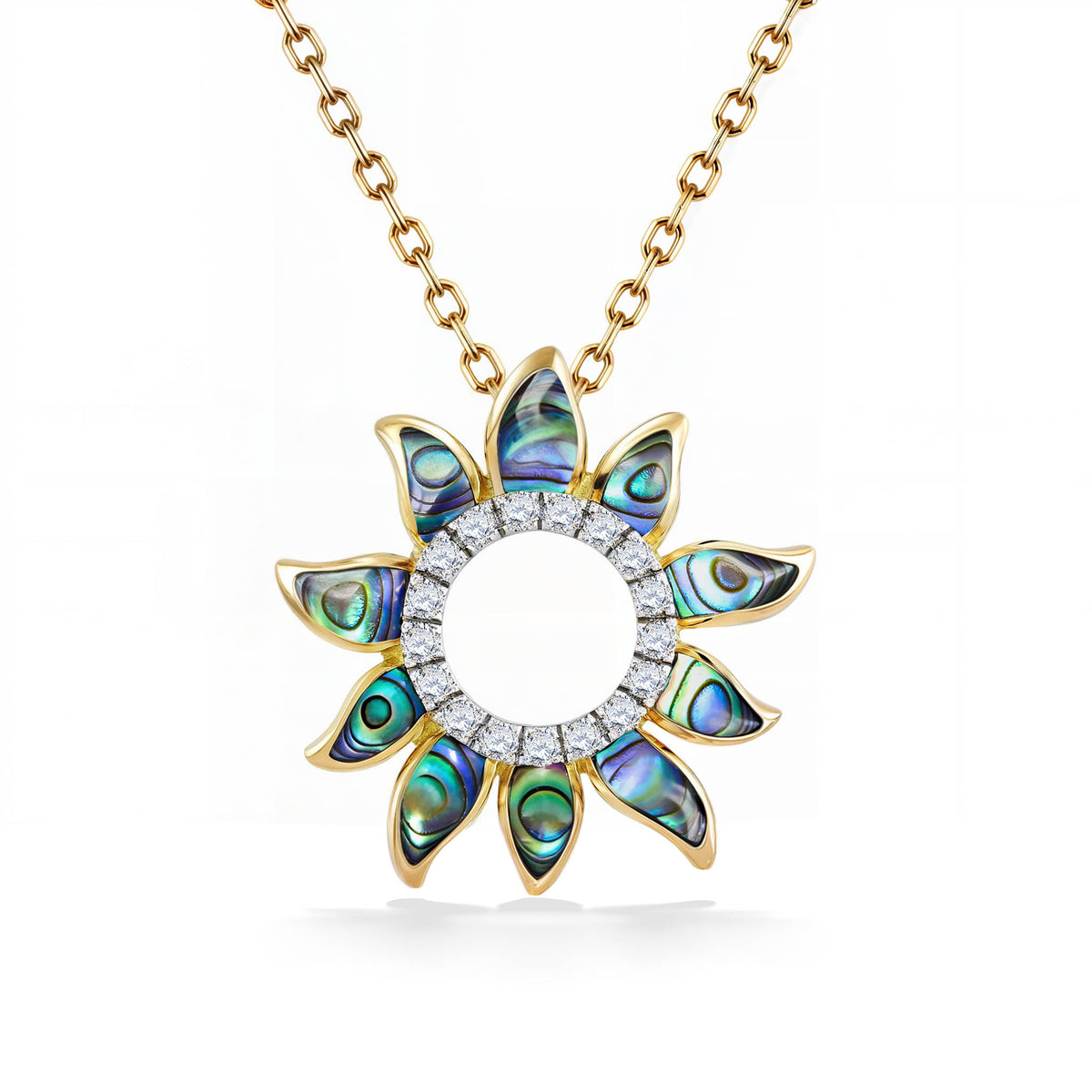 Sun-shaped pendant on gold chain with abalone inlay set in yellow gold rays and diamonds in inner circle. Item No. 47587