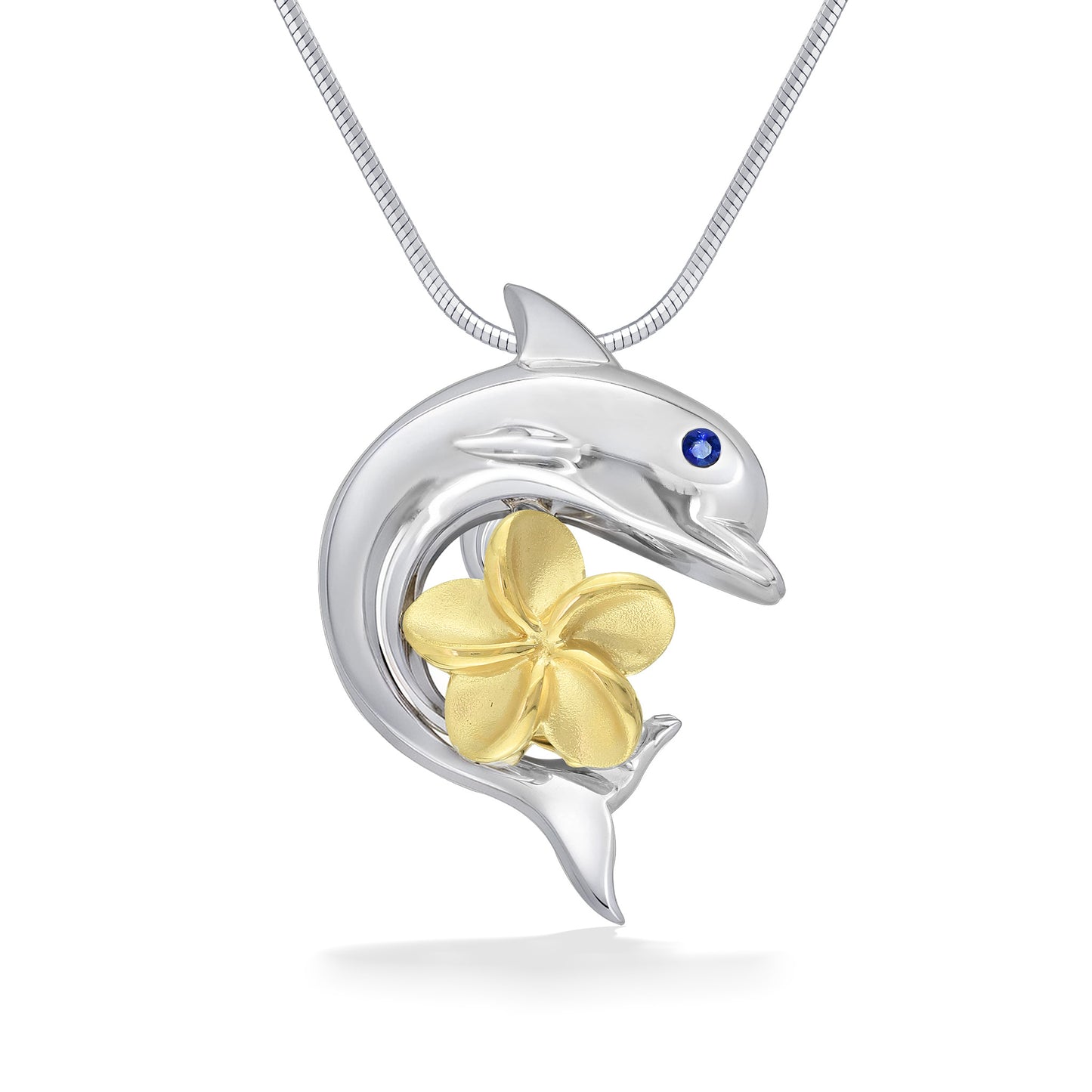 A cheerful sterling silver dolphin wraps around a 14k gold plumeria with a blue-sapphire twinkle in its eye. Item No. 43494