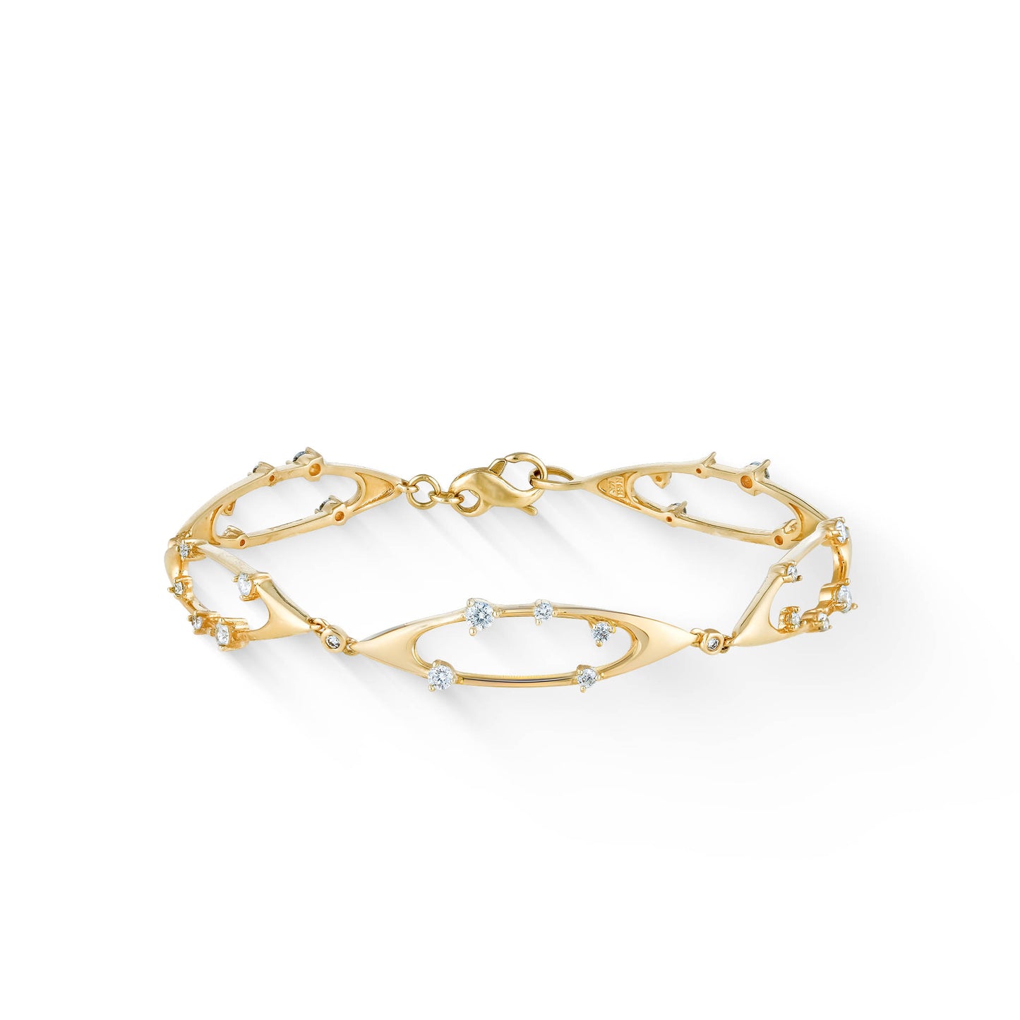 Side view of a 14K yellow gold celestial bracelet with marquise-inspired links and scattered round diamonds. Item No. 43987