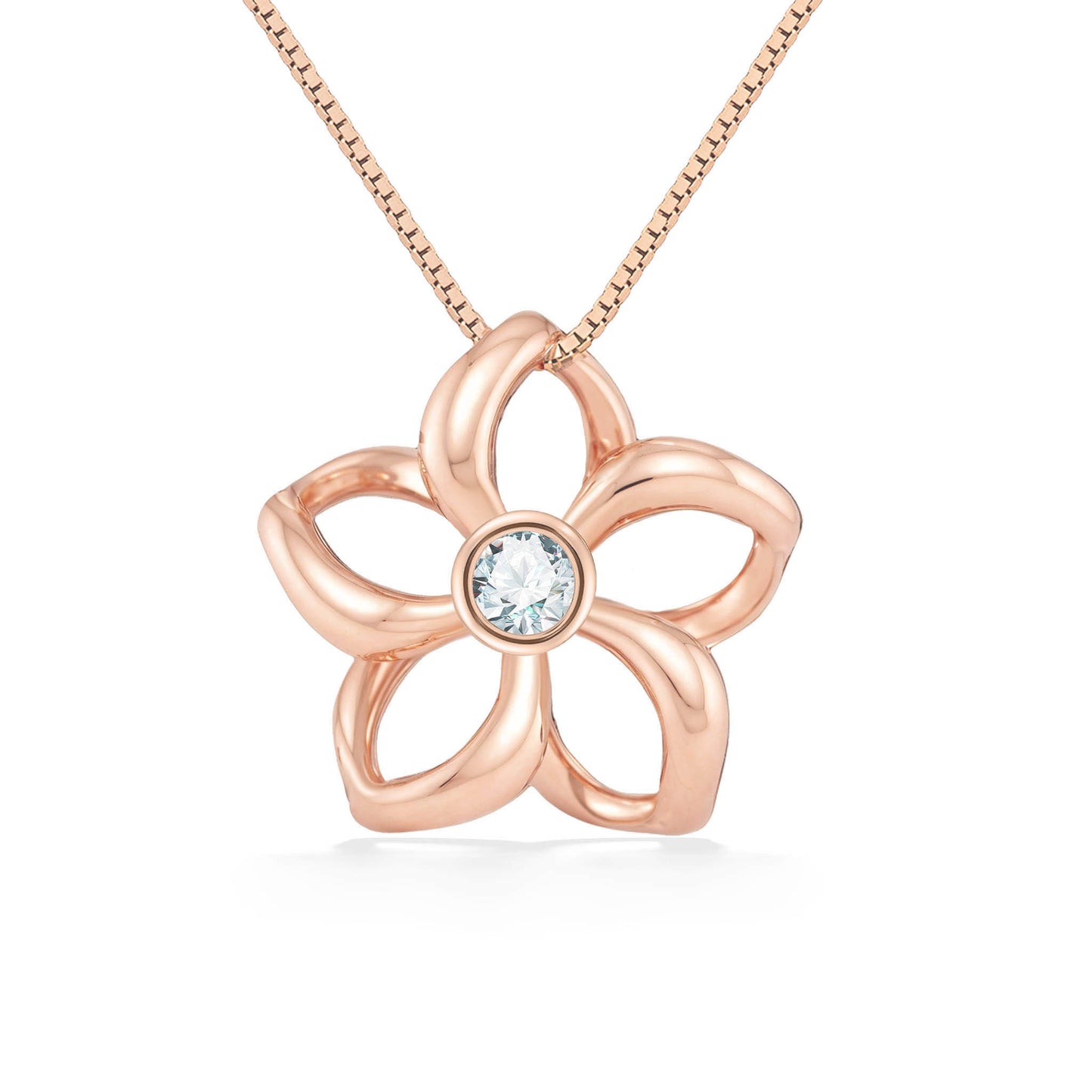 Rose gold floating plumeria pendant with a bezel-set diamond in the center of the flower. Item No. 43636