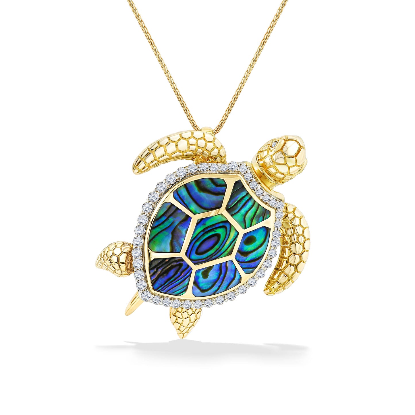 Lifelike crafted large turtle pendant in yellow gold with diamond outlined abalone inlay shell & diamond eyes. Item No. 44221