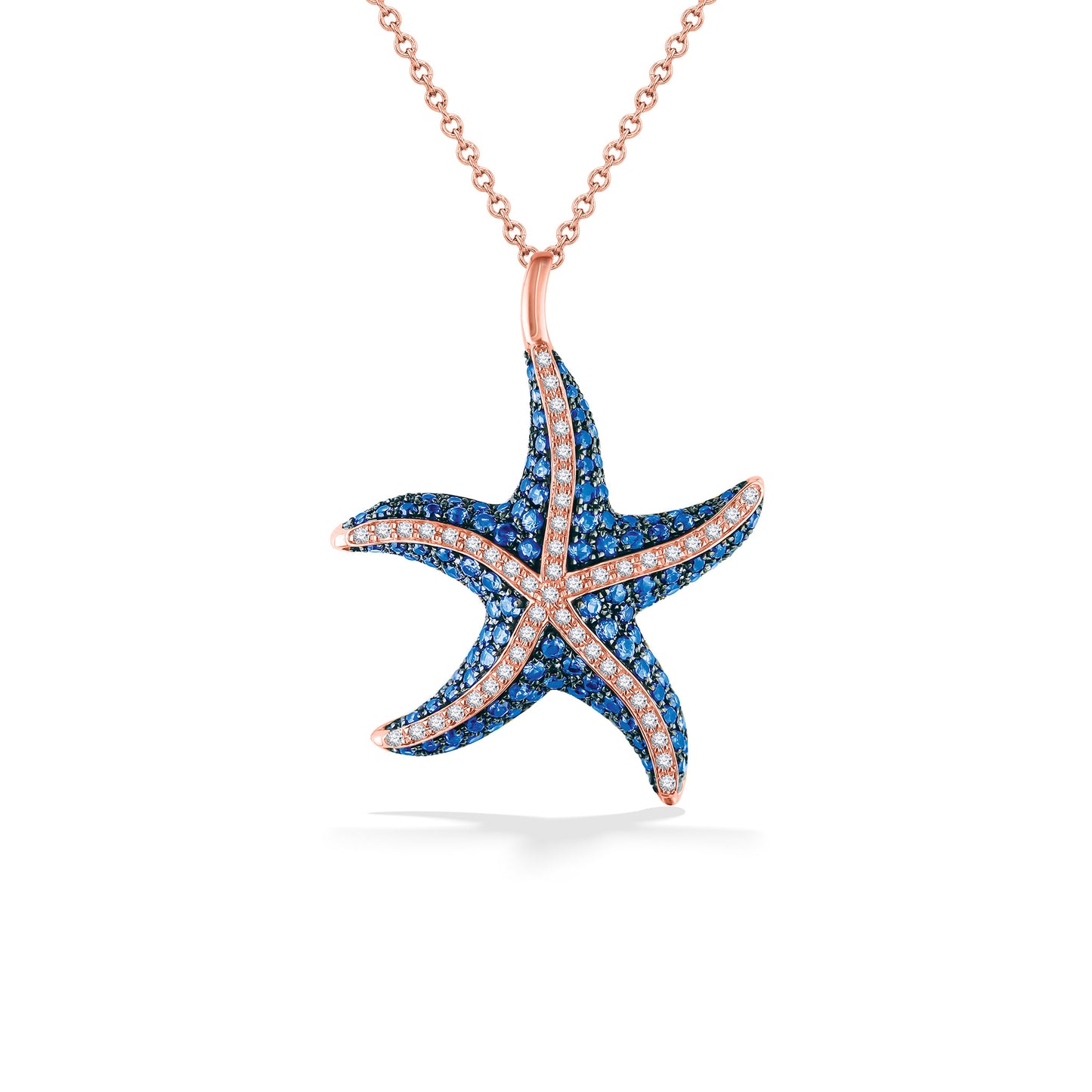 Rose gold starfish-shaped pendant set with vibrant blue sapphires and accent diamonds, shown on rose gold chain. Item 777233