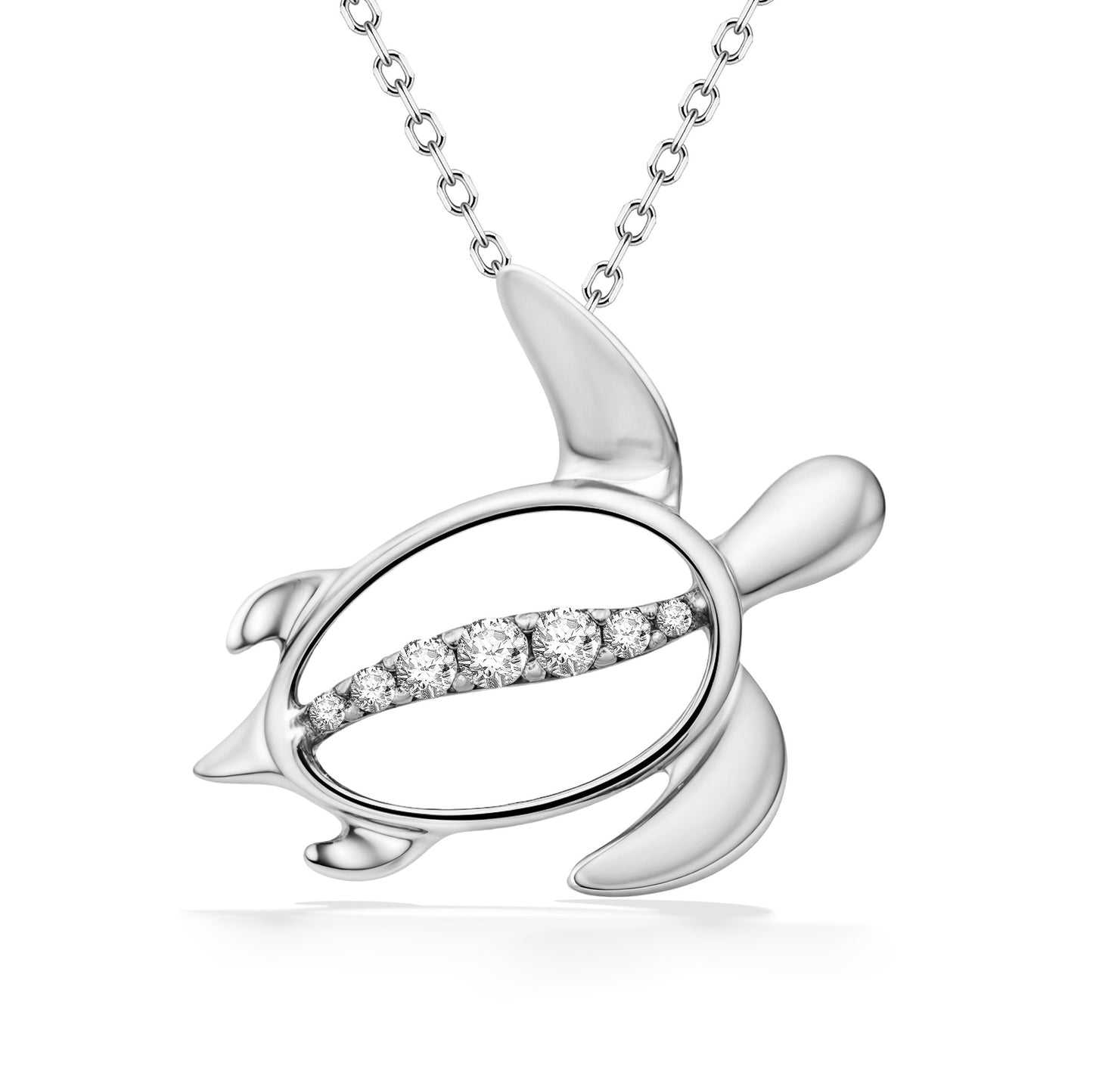 Honu pendant in 14k white gold with an open oval center accented by a line of brilliant diamonds. Item No. 44431