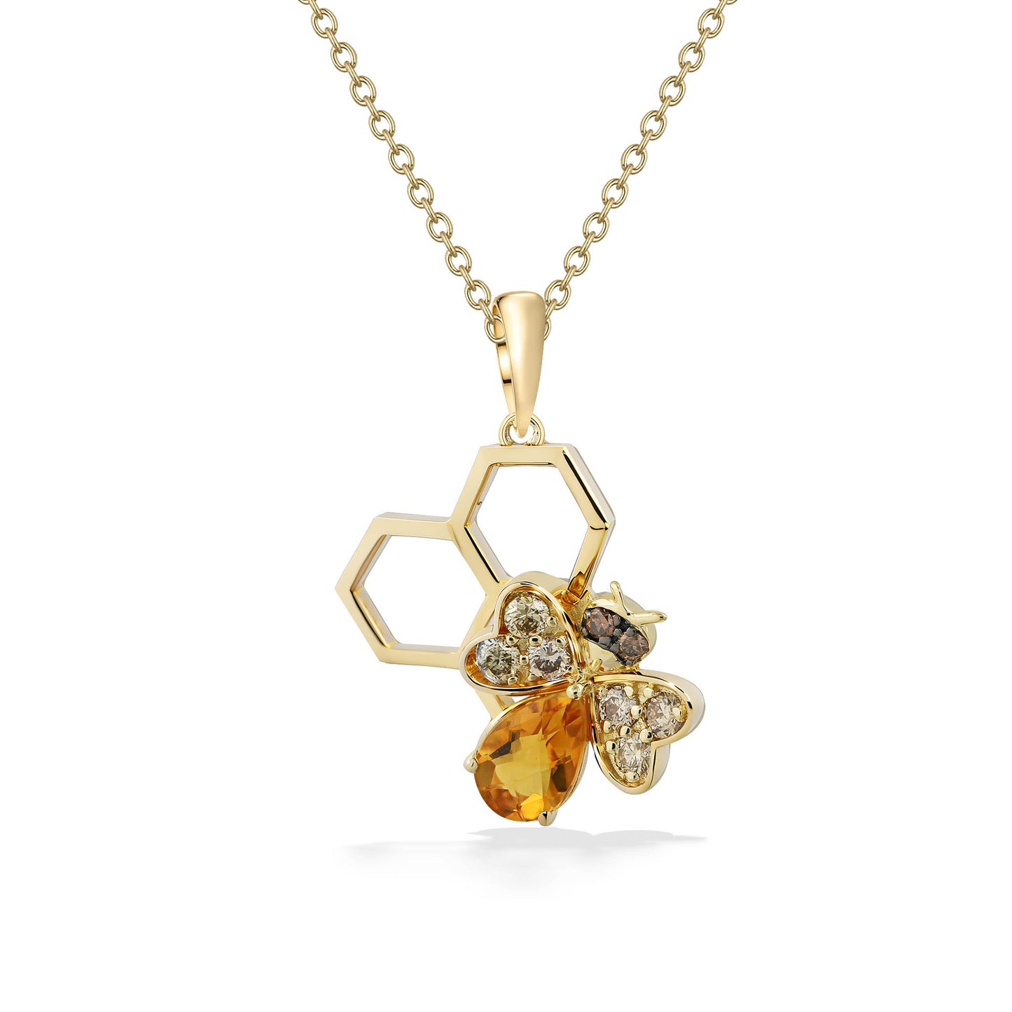 Pendant in yellow gold with cutout honey combs & citrine body bee, white diamond wings & brown diamond eyes. Item No. 773152