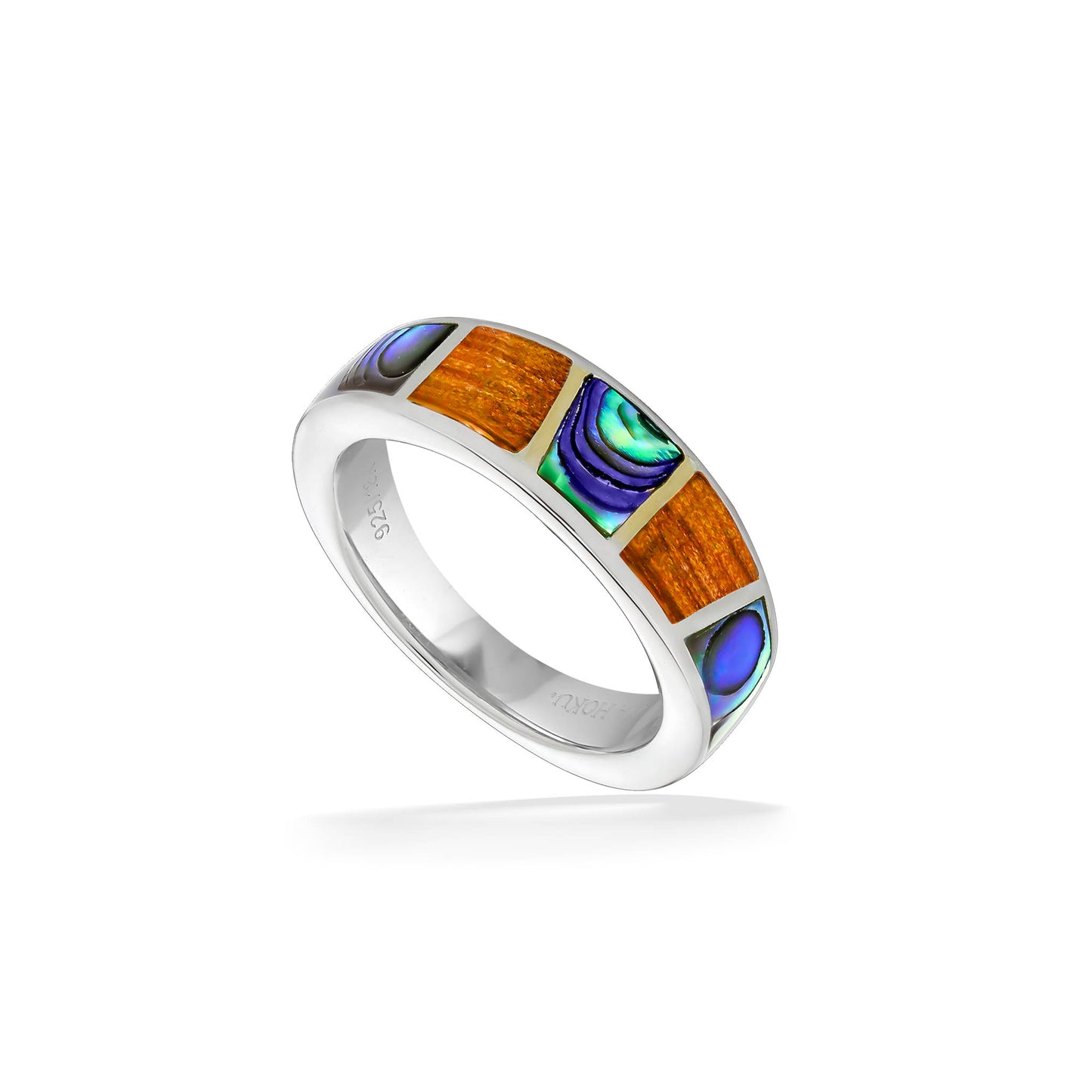 Perspective view of band emphasizing geometric inlay pattern and reflective abalone finish. Item No. 44596