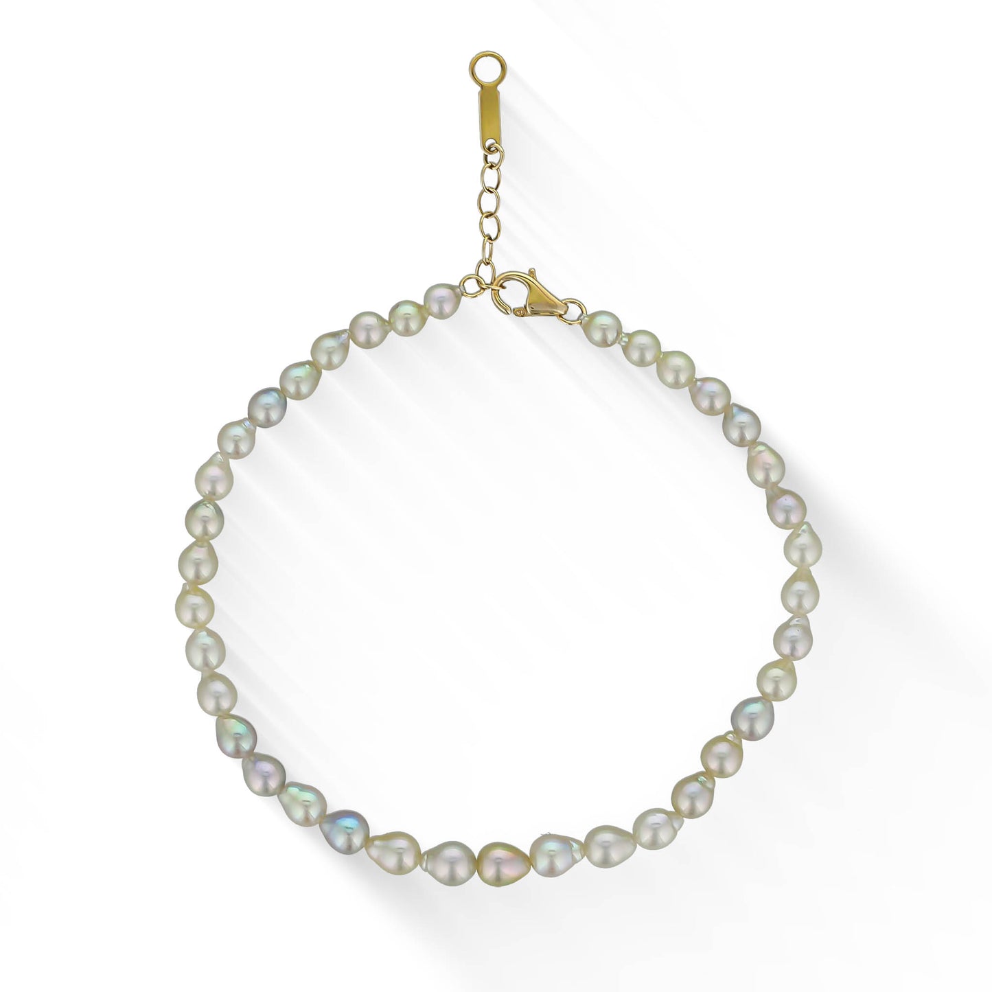 Adjustable gold bracelet featuring multicolor Akoya pearls in soft pastel tones linked along a fine chain. Item No. 773452