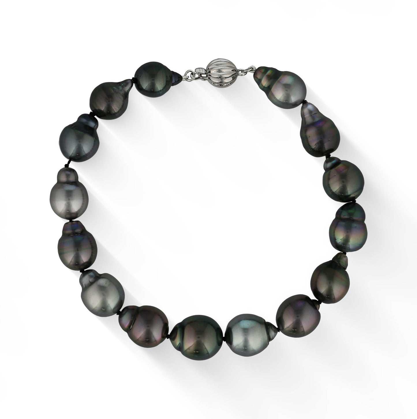 Elegant tahitian pearl bracelet featuring 9-12mm baroque pearls, gradually arranged & a 14k white gold clasp. Item No. 773519
