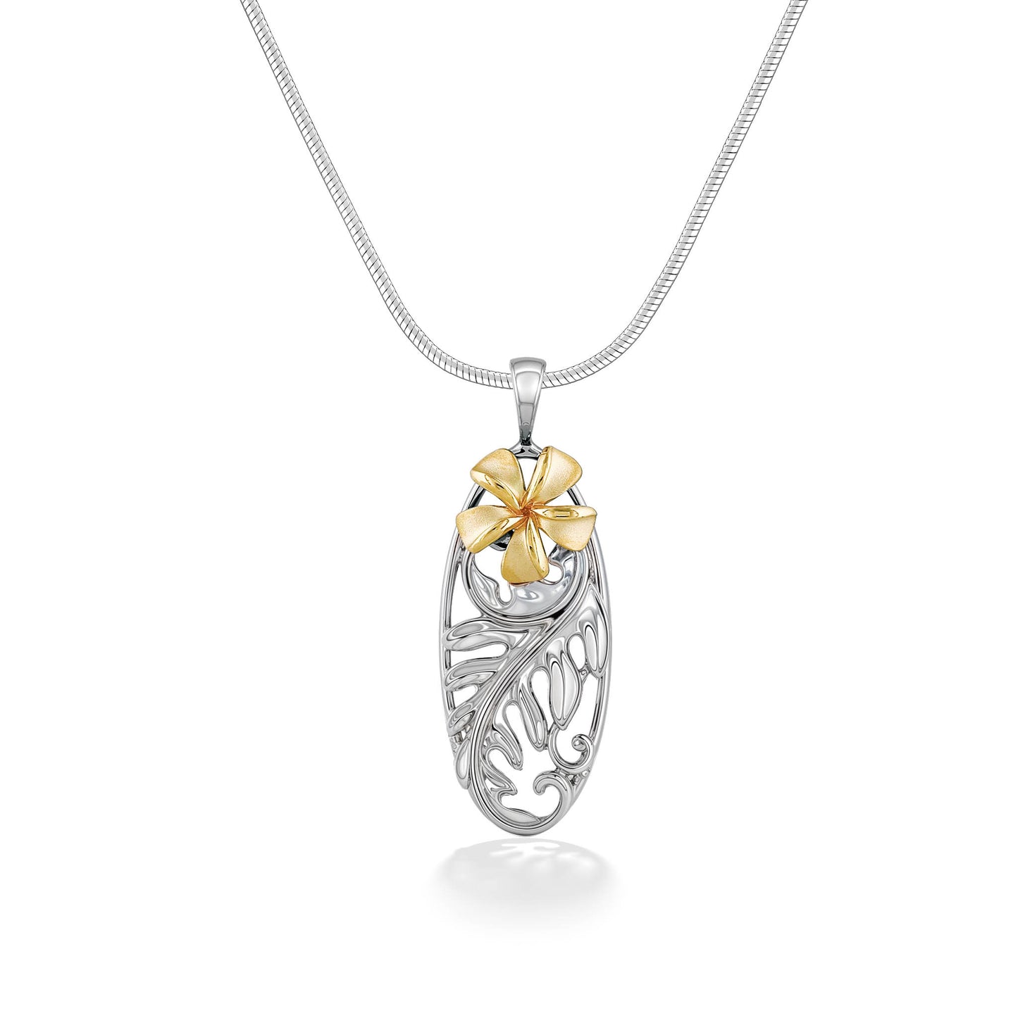 Oval-shaped sterling silver pendant with ulu leaf design and a 14k yellow gold plumeria on top by the bail. Item No. 44897