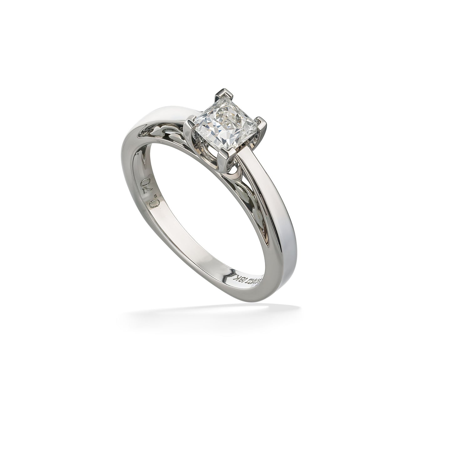 A Princess 3/4 Carat H-VVS2 center diamond set on a Na Hoku Solitaire Ring band. Item 37600