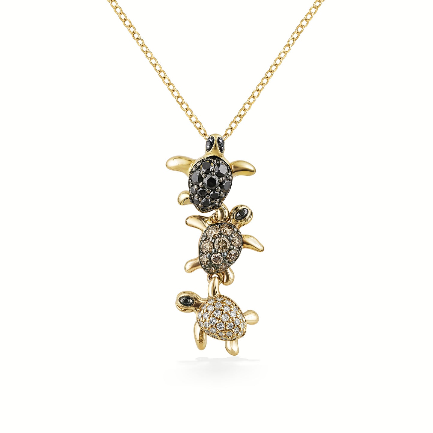 Yellow gold 3-turtle pendant with black, brown, and white pavé-set diamond shells & black diamond eyes. Item No. 773738
