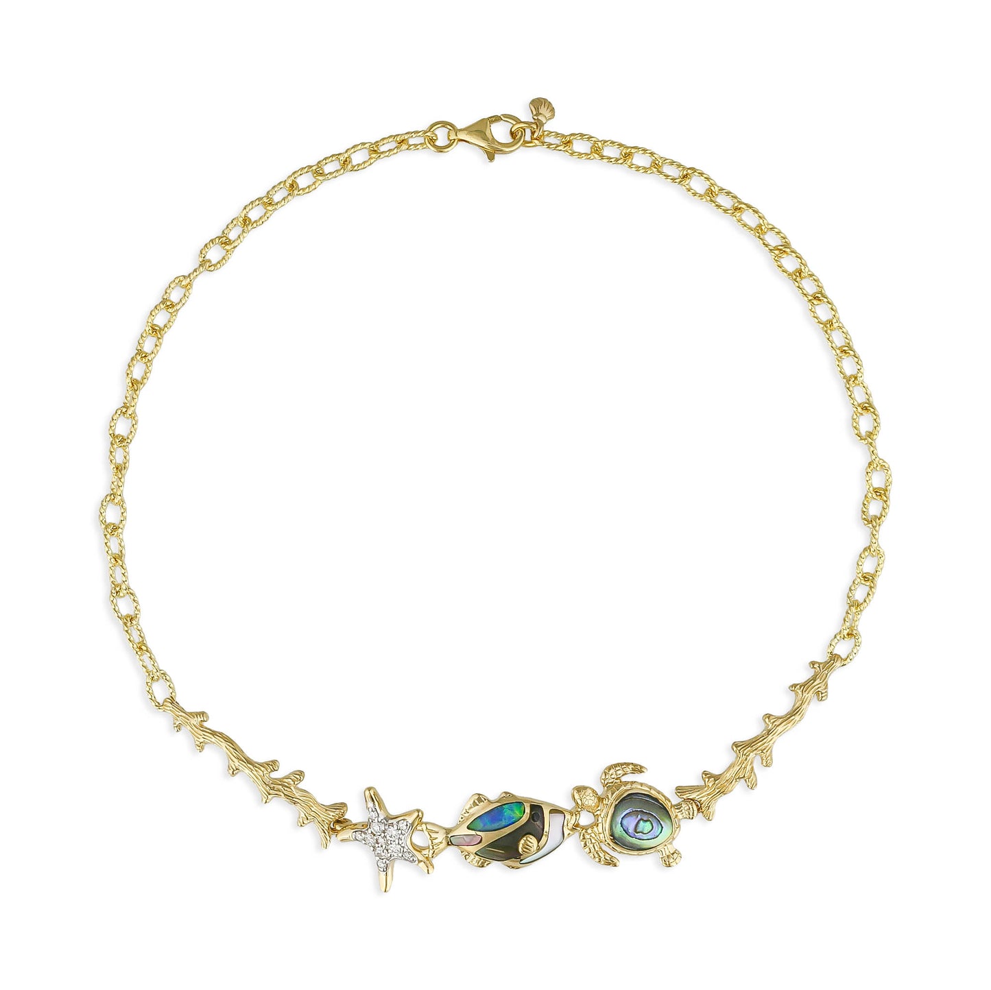 Gold textured link bracelet with a diamond starfish charm, fish & turtle charms with inlay between gold coral. Item No. 45200