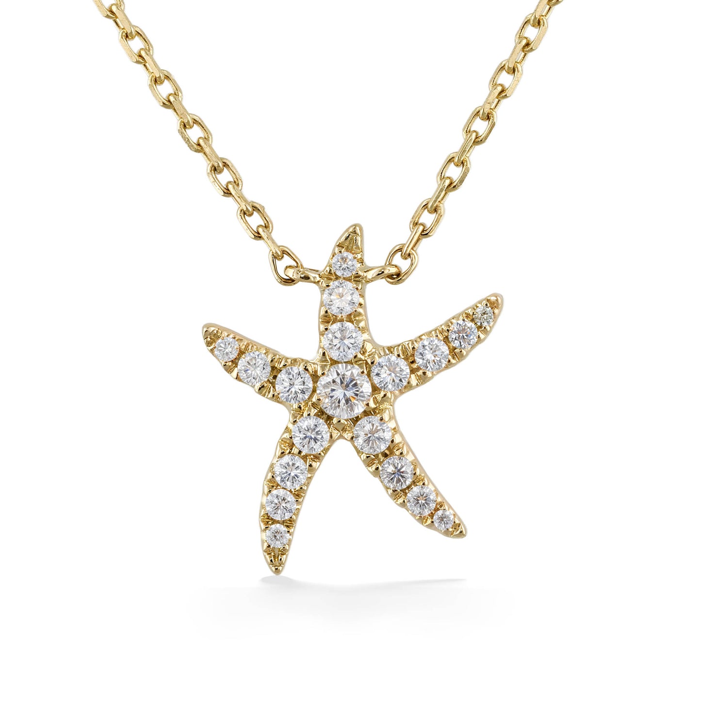 Dazzling starfish pendant necklace featuring pavé-set round white diamonds set in 14k yellow gold. Item No. 774136