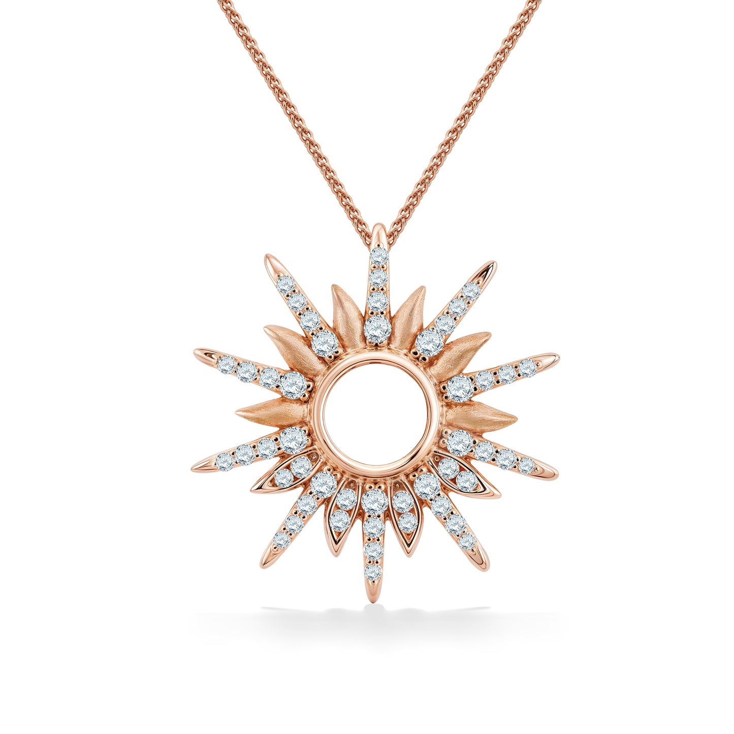 A rose gold diamond sunburst pendant with an open circular center and bright white diamonds radiating outward. Item No. 45282
