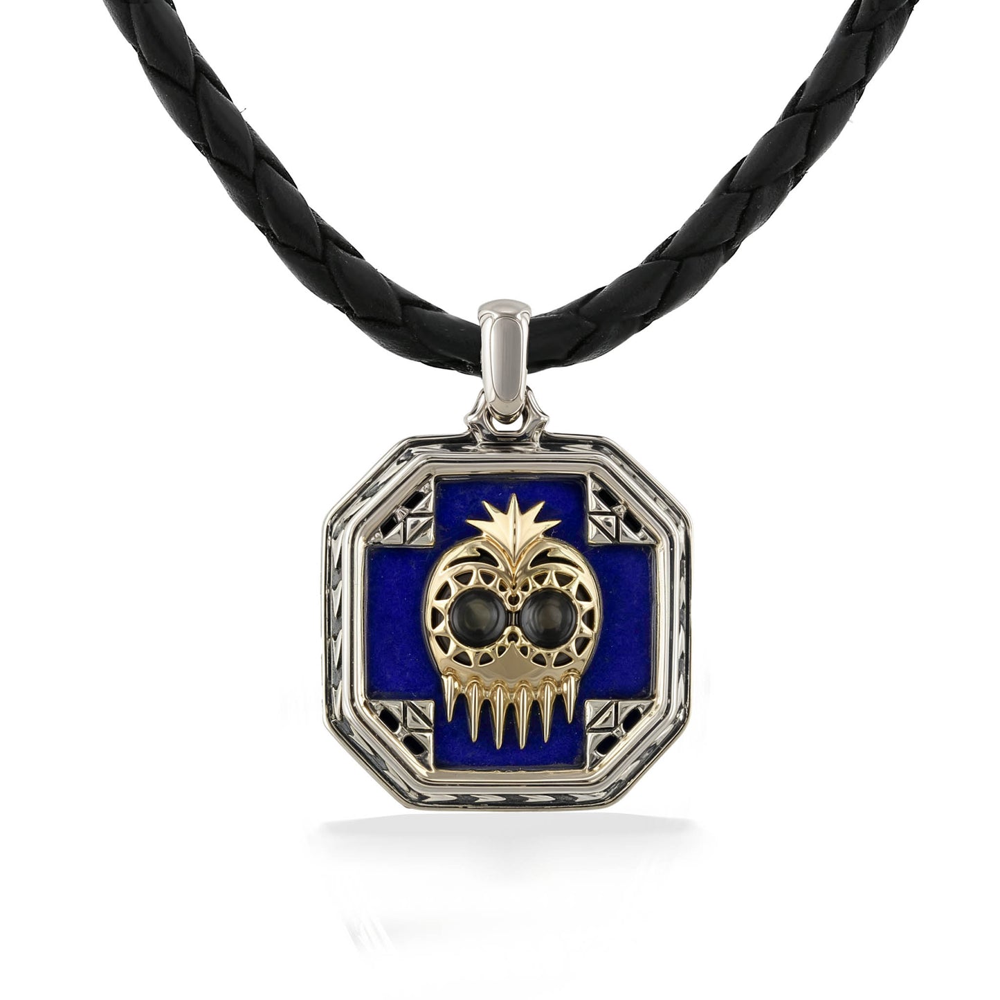 Pendant with a blue lapis inlay & gold Ikaika warrior helmet framed in silver on a black braided cord. Item No. 45302