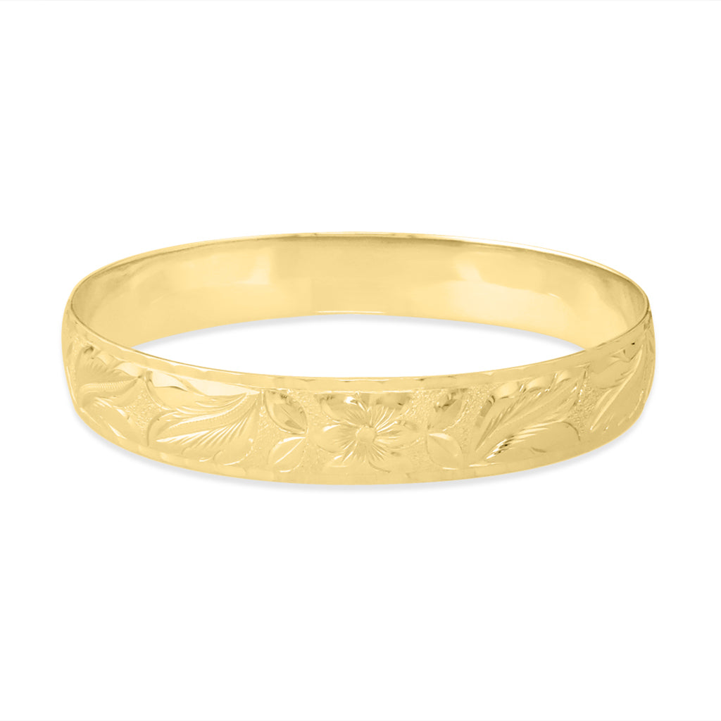 Yellow gold Hawaiian Heirloom bangle bracelet with hand-engraved plumeria scroll pattern and scalloped edges. Item No. 73615