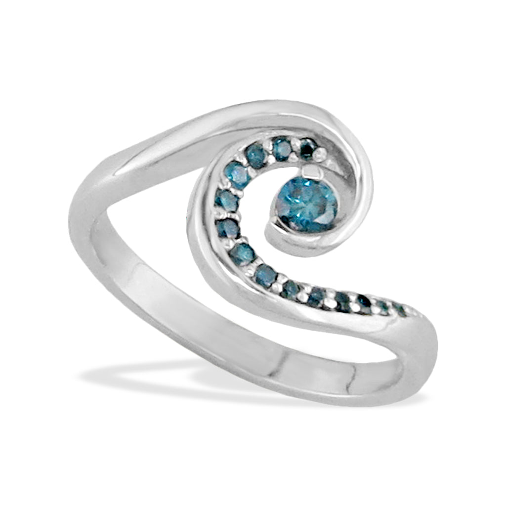 Wave ring made in 14k white gold with ocean-blue diamonds in a curling surf-inspired design. Item No. 40134