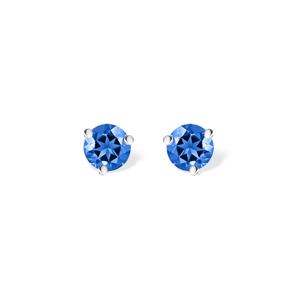 Blue round Sapphire stud earrings in 14k white gold, each measuring 1/8" in diameter. Item No. 40253
