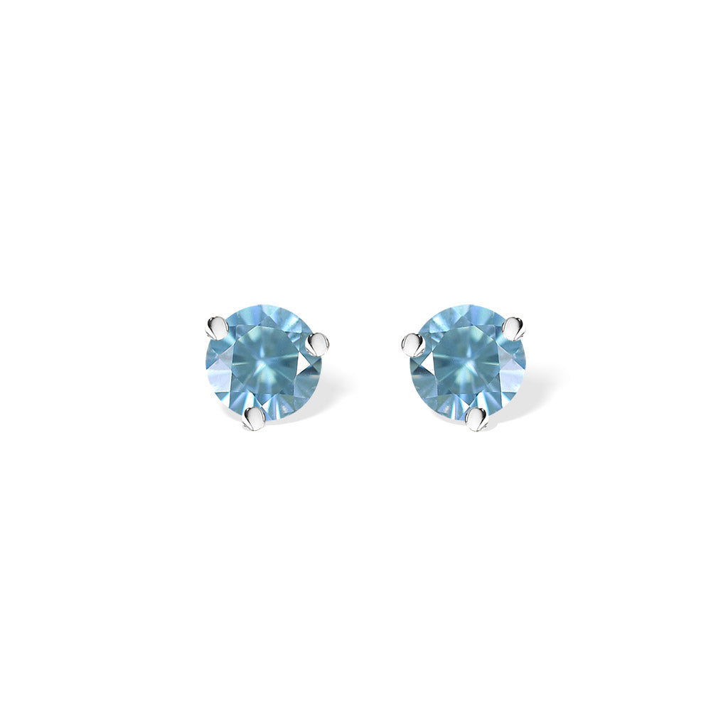 Simple stud earrings with three-prongs made in 14K white gold holding round blue zircon gemstones. Item No. 40268
