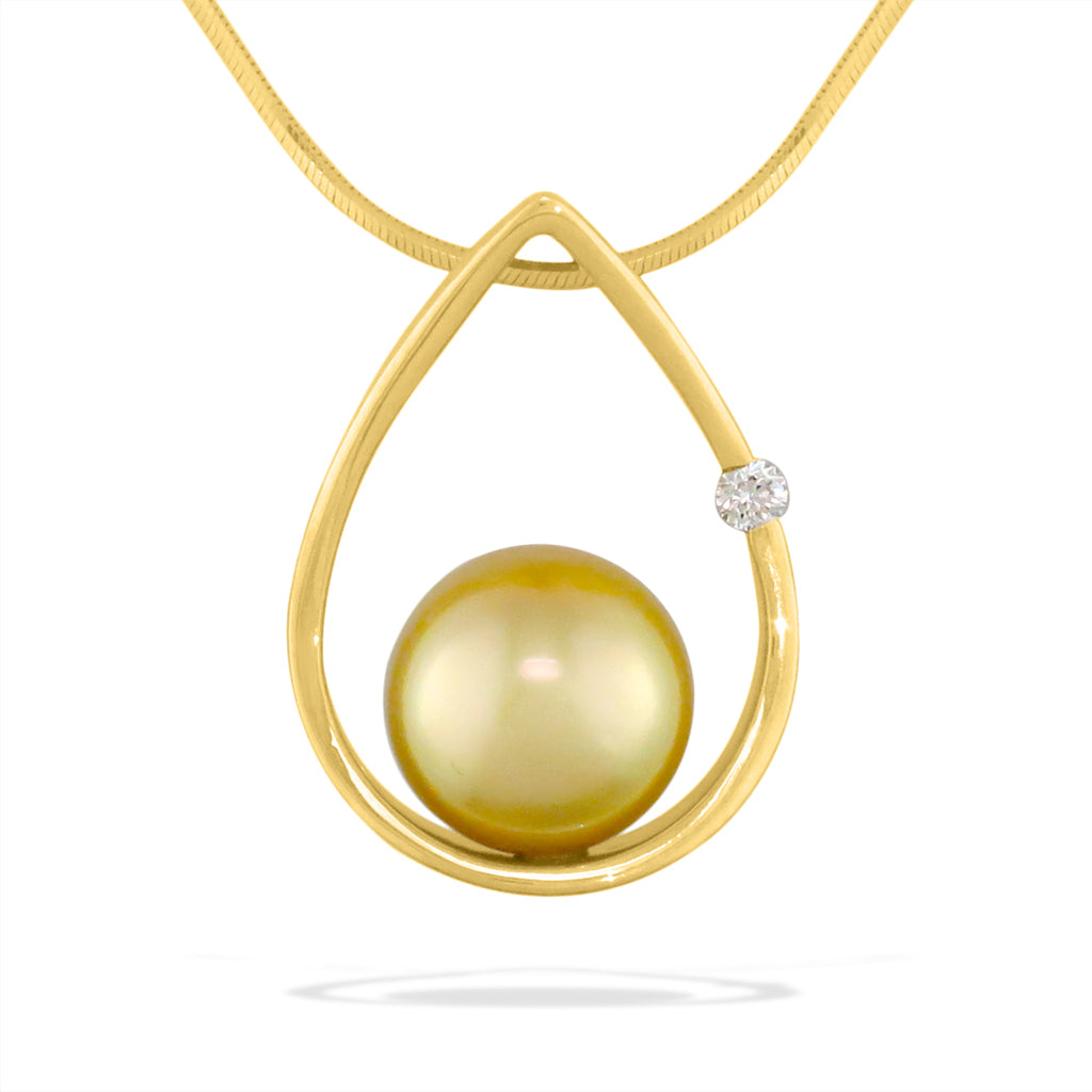 Large raindrop pendant in yellow gold cradling a 10mm Golden South Sea pearl with 0.05 carat diamond accent. Item No. 40290