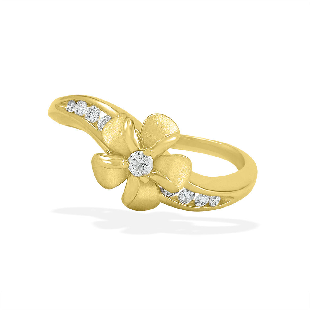 Wavy band design in yellow gold with channel-set diamonds, showcasing a plumeria atop with a diamond center. Item No. 18744