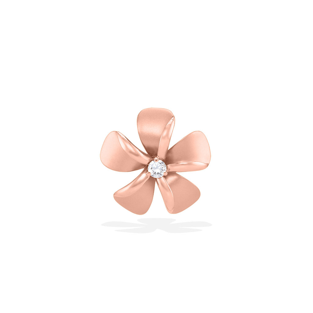 Rose gold 15mm plumeria slide pendant with a round diamond in the center and matte petals with polished edges. Item No. 19764