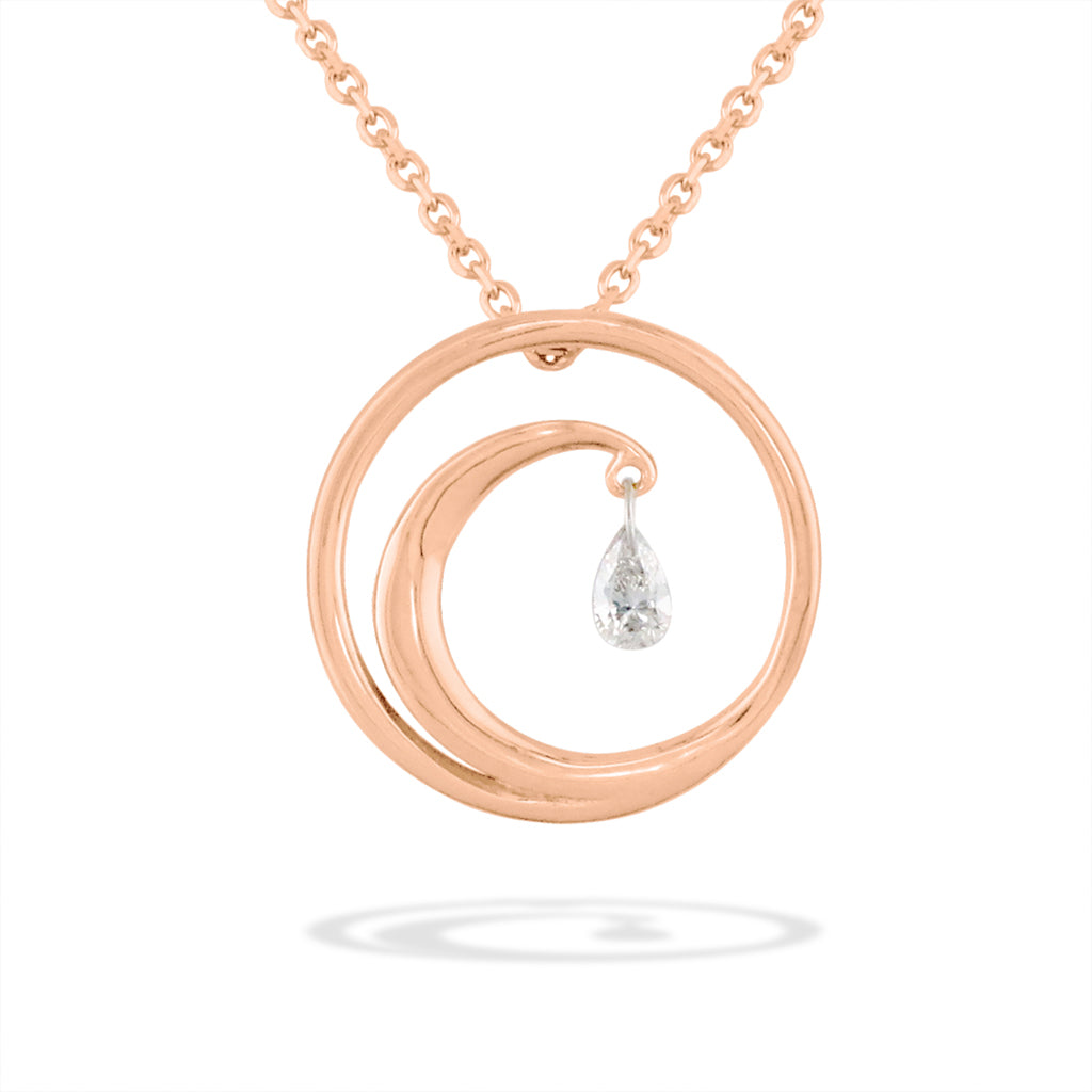 Delicate 14k rose gold curves into a wave design, holding a pear-shaped shimmer diamond suspended inside. Item No. 19935