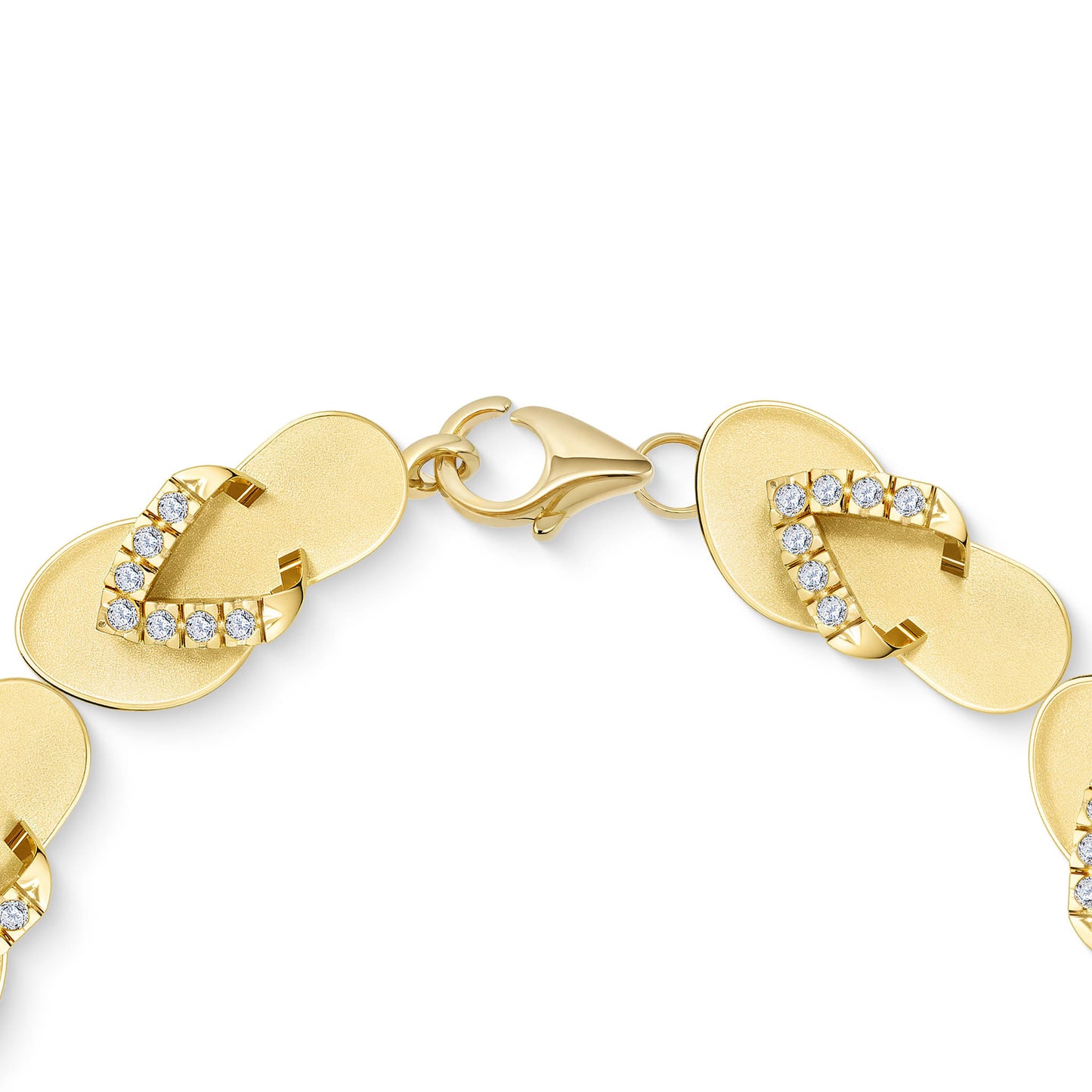 Detailed close-up of the lobster clasp and flip-flop links on a yellow gold diamond bracelet. Item No. 10643