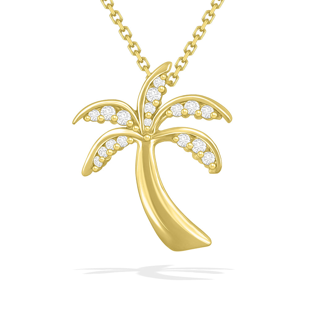 Palm tree pendant made in 14k yellow gold with pavé-set diamond leaves, hung on a gold chain. Item No. 10509