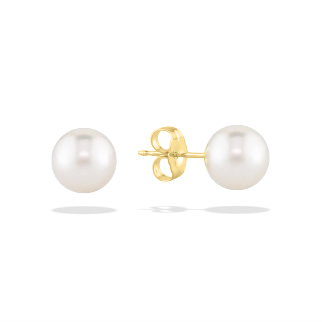 Classic white akoya pearl studs featuring luminous pearls & right side showing 14K yellow gold post & earnut. Item No. 14276