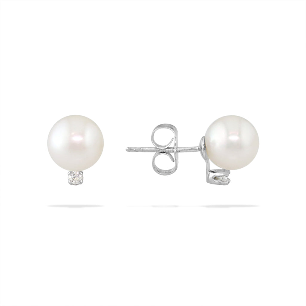 Side profile of white Akoya pearl stud earrings with small diamond accents, highlight the white gold setting. Item No. 13080