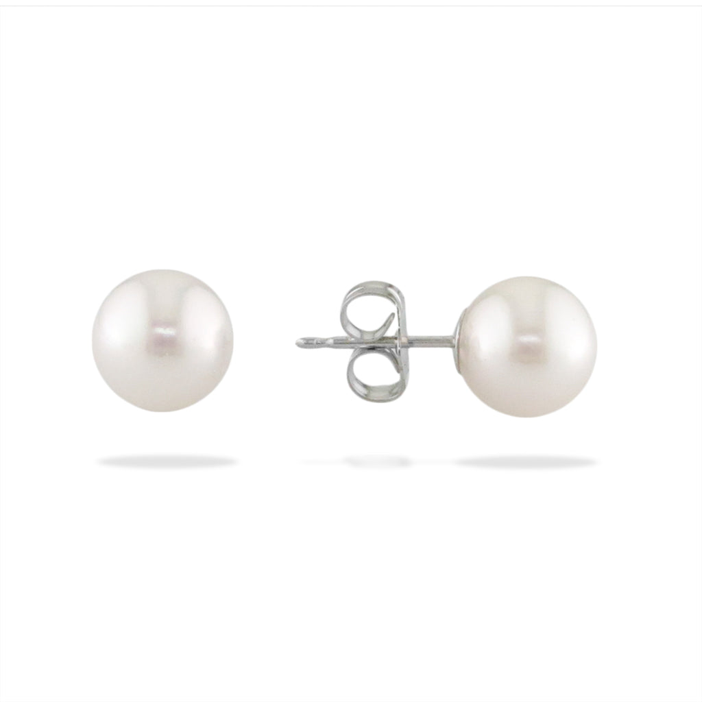 Pair of white akoya pearl studs, one shown from front & one angled to display 14k white gold post & earnut. Item No. 19215