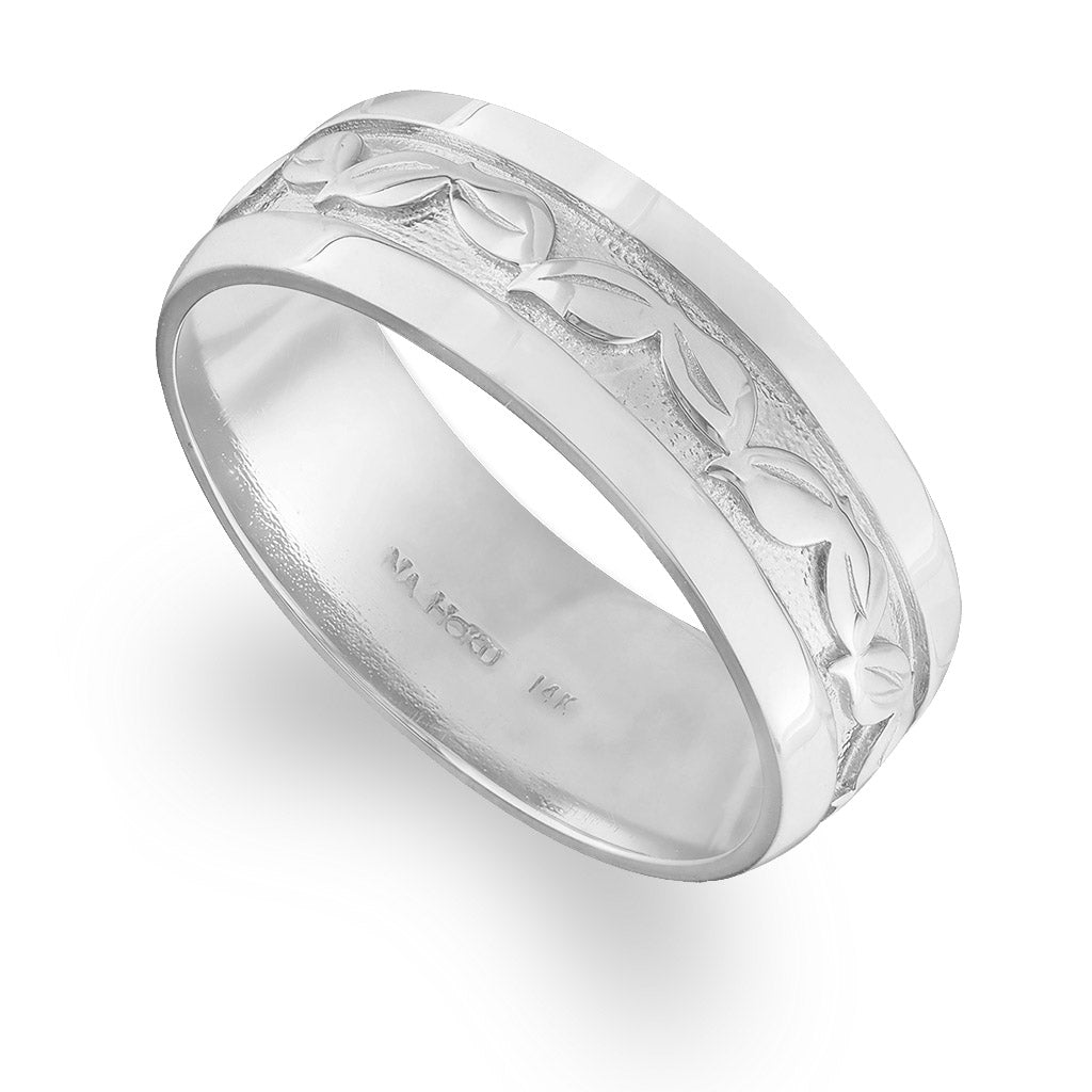 Crafted in 14K white gold, this 8mm maile leaf band features engraved scroll detail in Size 10. Item No. 19472
