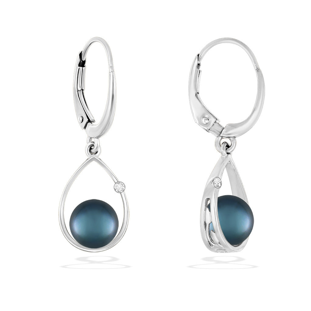 Partial view of blue Akoya pearl drop earrings highlighting curved white gold setting and leverback closure. Item No. 1947