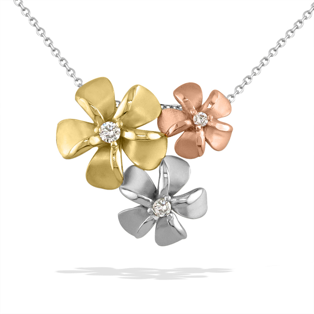 Polished & matte finished, tri-color gold, 3-plumeria pendant with diamond centers hung on a white gold chain. Item No. 40548