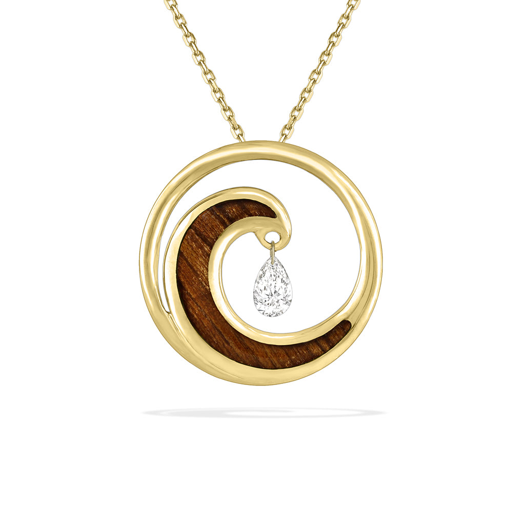 Rich koa wood inlay curled in a wave design with a dangling diamond shimmer, set in 14K yellow gold. Item No. 43040