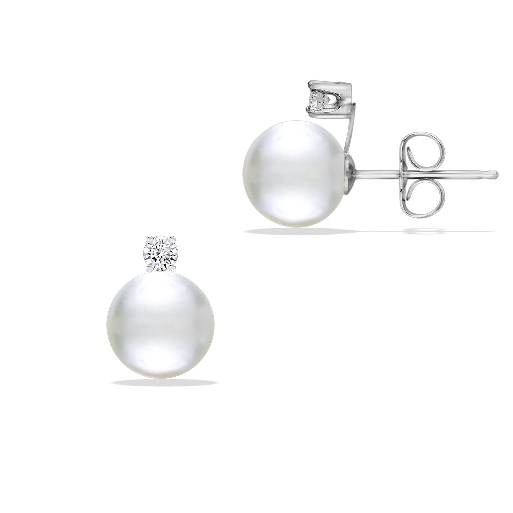 Side profile of pearl stud earrings with secure post backs and diamond settings above each Akoya pearl. Item No. 41604