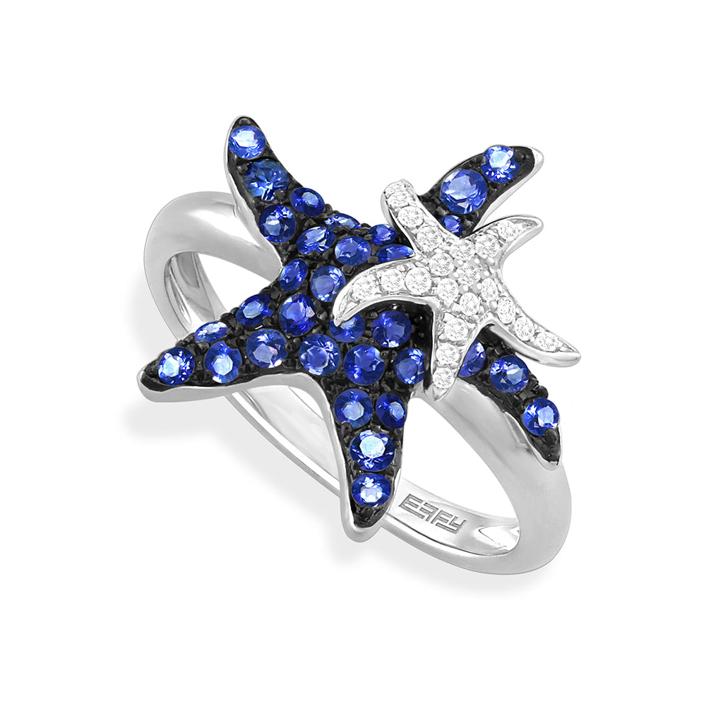 White gold starfish ring with blue sapphires and small diamond accented starfish on top. Item No. 769574