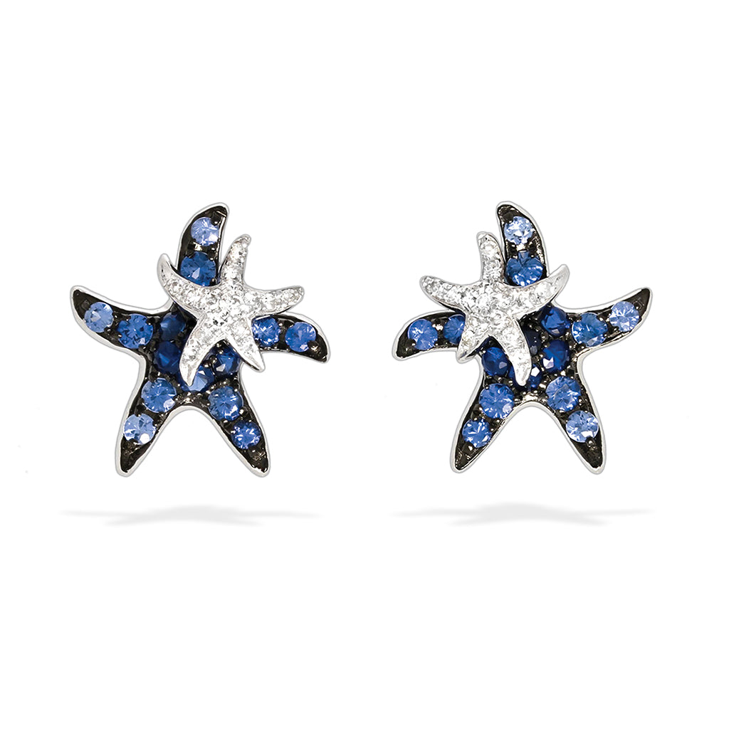 A pair of 14k white gold starfish stud earrings with blue sapphires and a mini diamond accented on top each. Item No. 769575