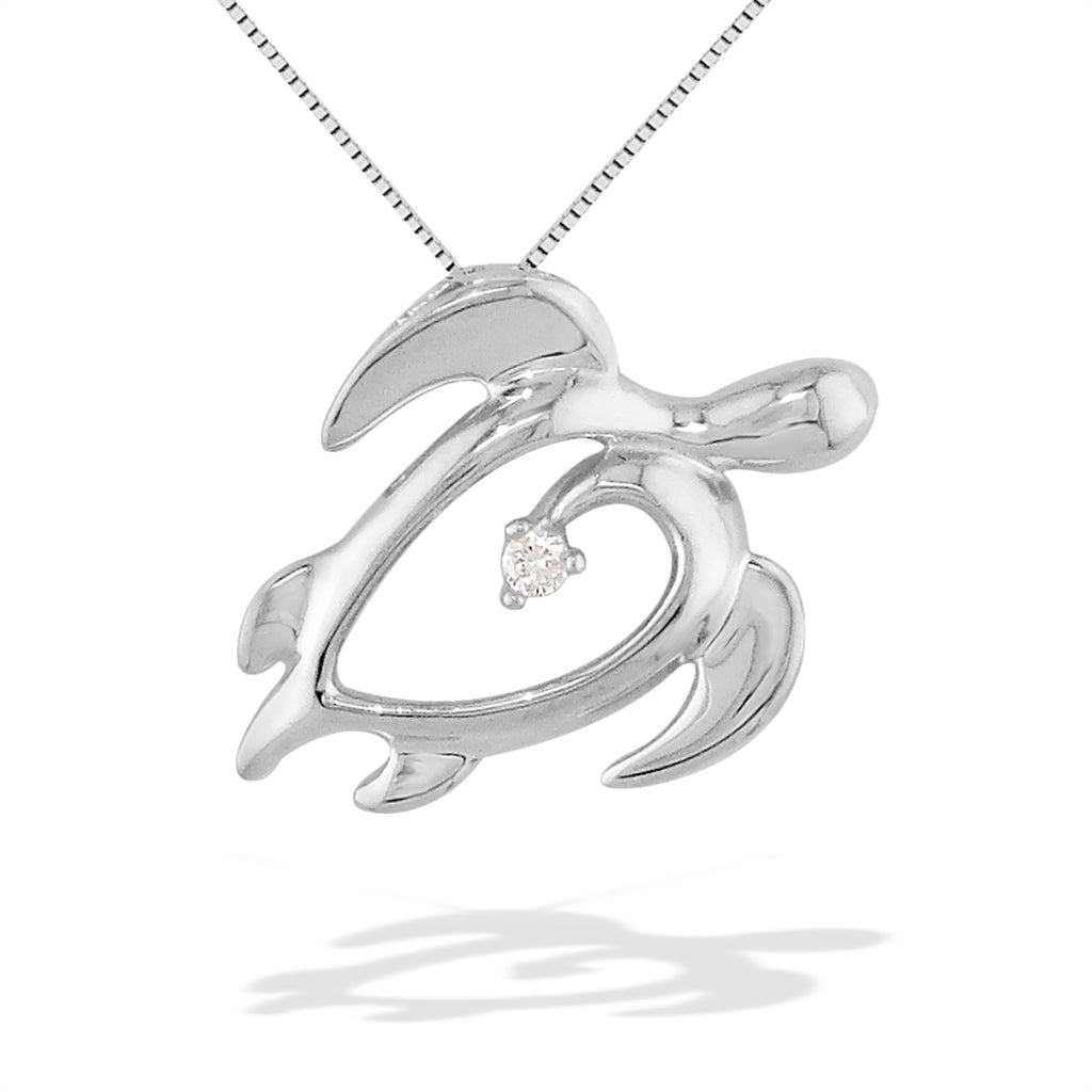 White gold Honu (Hawaiian Sea Turtle) pendant with heart-shaped hollow middle and diamond center. Item No. 41052