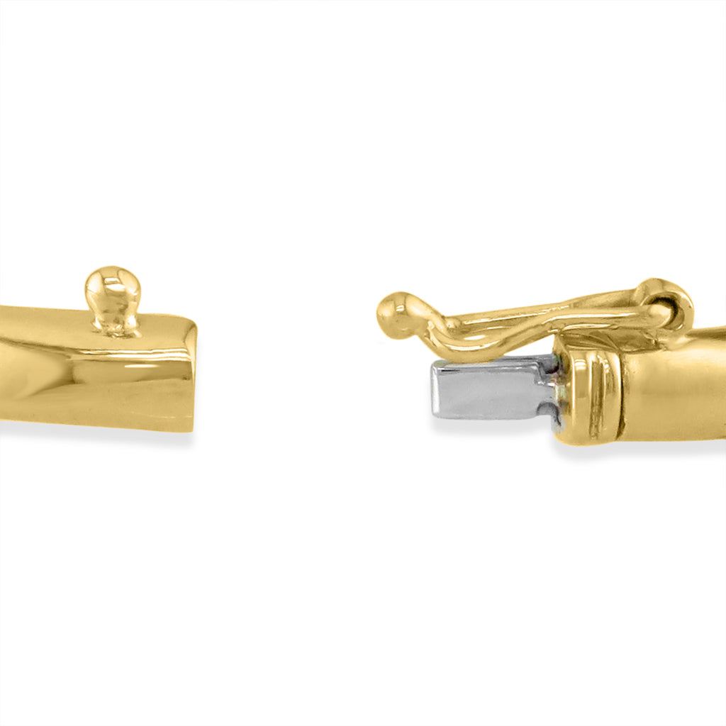 Close up view of the opened box clasp in 14K yellow gold, showing a 14K white gold tongue. Item No. 41026